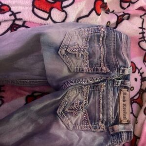 Rock Revival Blue Boot Cut Jeans with Signature Embroidery